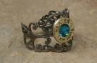 Ammo Ring with Blue Zircon Crystal and Gun Metal Filigree Band